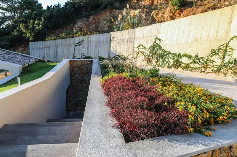 Garden steps and planting between the villas