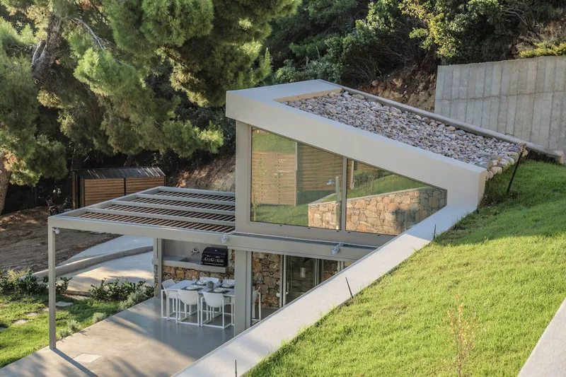 The villa’s green roof and terrace from above
