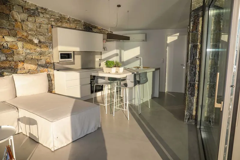 The living room and the kitchen