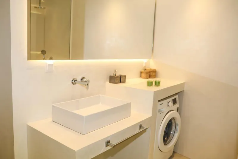 A basin and the washing machine