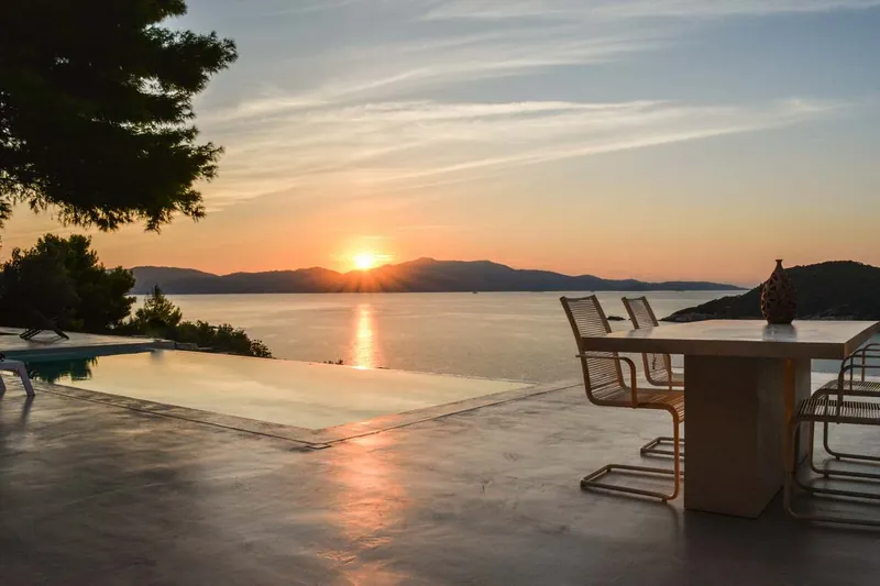 Sunset over the sea from the terrace dining table