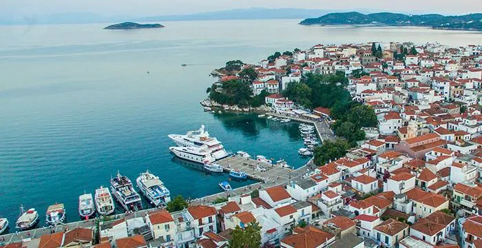 The Old Port of Skiathos Town and its red roofs from above
